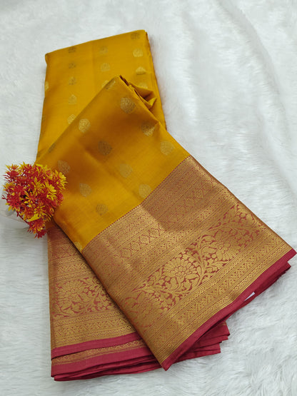 Yellow Pure Silk Saree with Pink Border