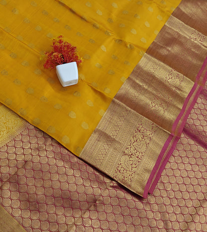 Yellow Pure Silk Saree with Pink Border
