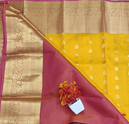 Yellow Pure Silk Saree with Pink Border