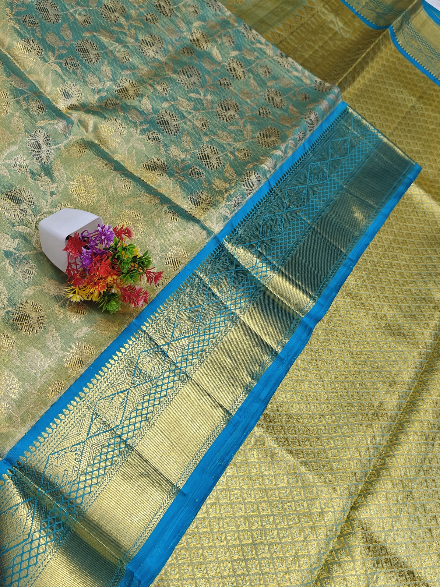 Green Tissue Silk Saree with Sky blue Border