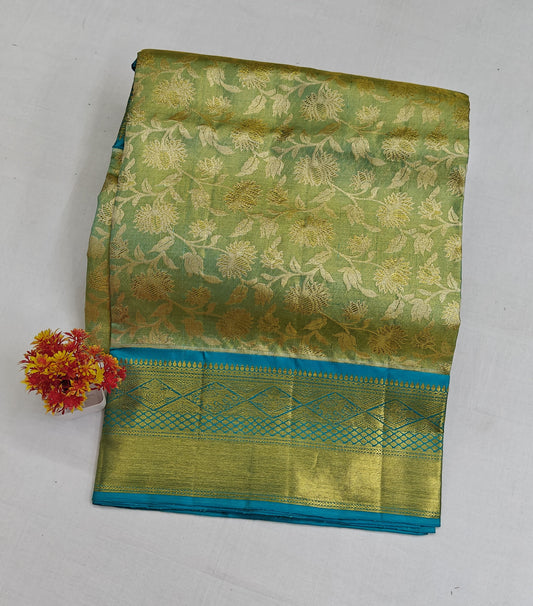 Green Tissue Silk Saree with Sky blue Border