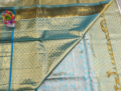 Green Tissue Silk Saree with Sky blue Border