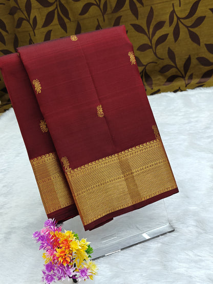Maroon Self Pure Silk Saree with Gold Border
