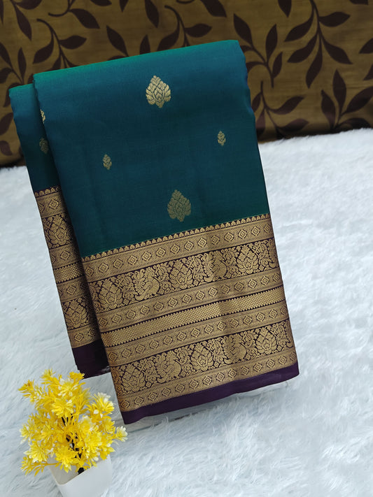 Peacock Green Pure Silk Saree with Purple Border