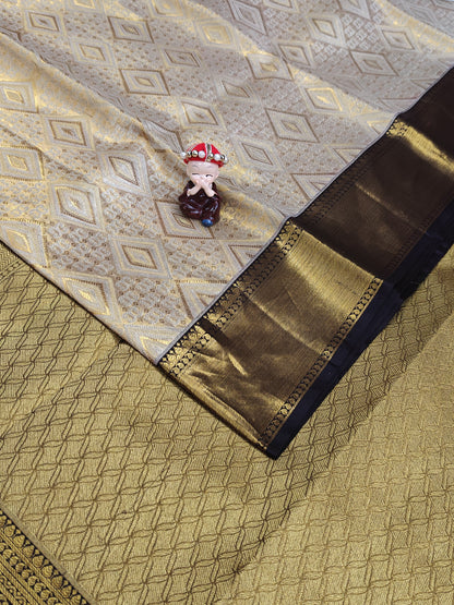Gold Tissue Saree with Coffee Brown Border