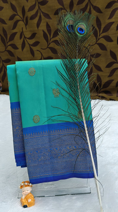 Sea Green Pure Silk Saree with Royal Blue Border