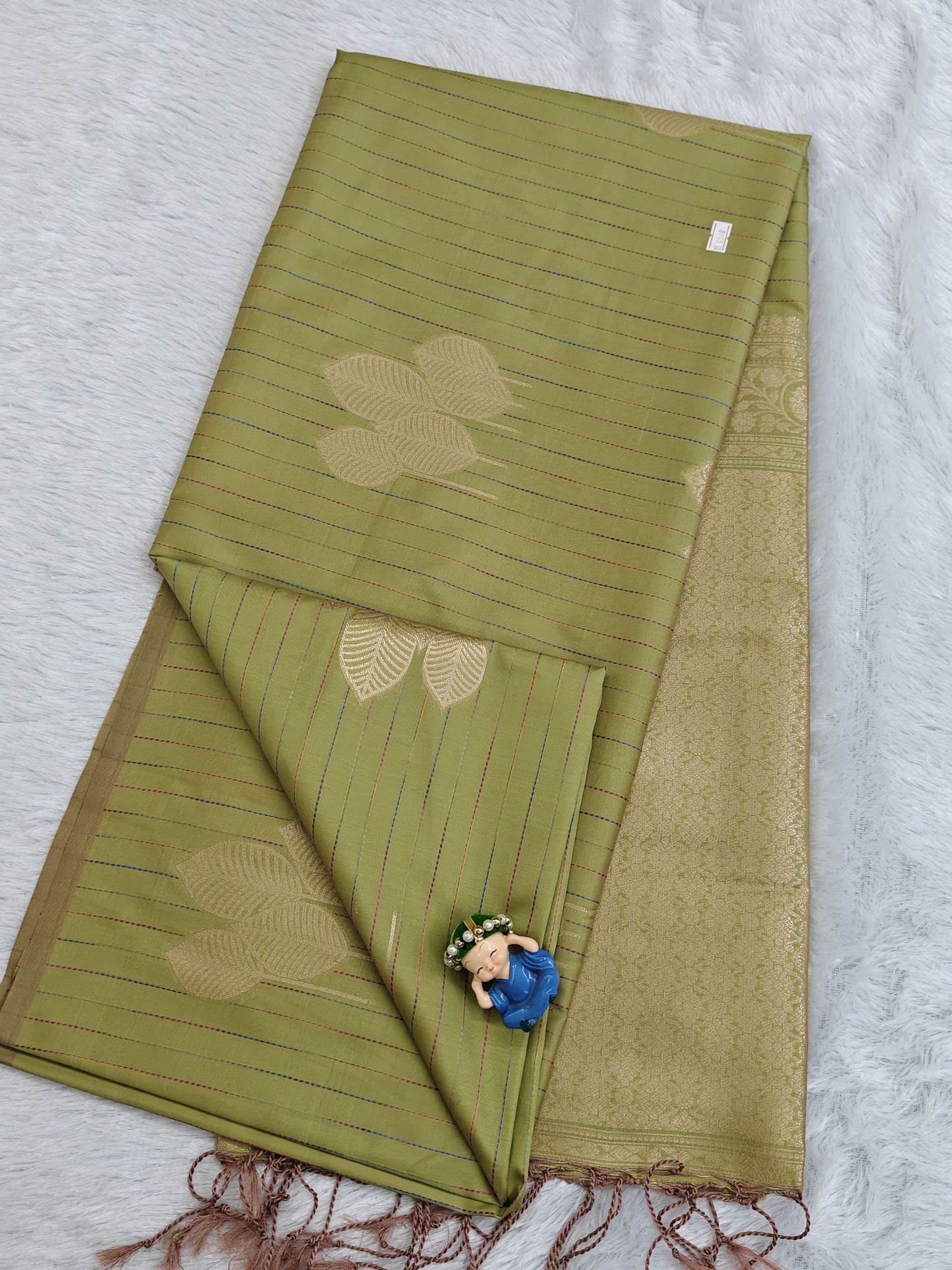 Pista Green Semi Soft Silk Saree