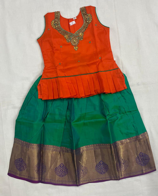 Orange Embellished Top with Emerald Green Pattu Pavadai